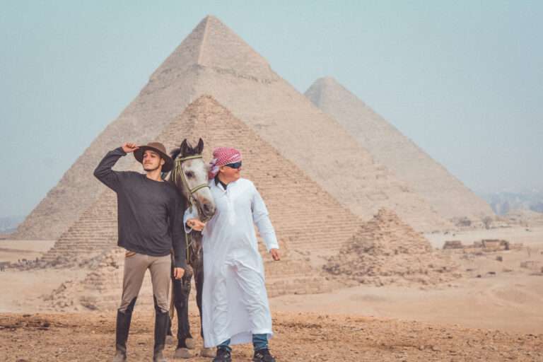 Guest and guide with an Arabian horse at the Pyramids