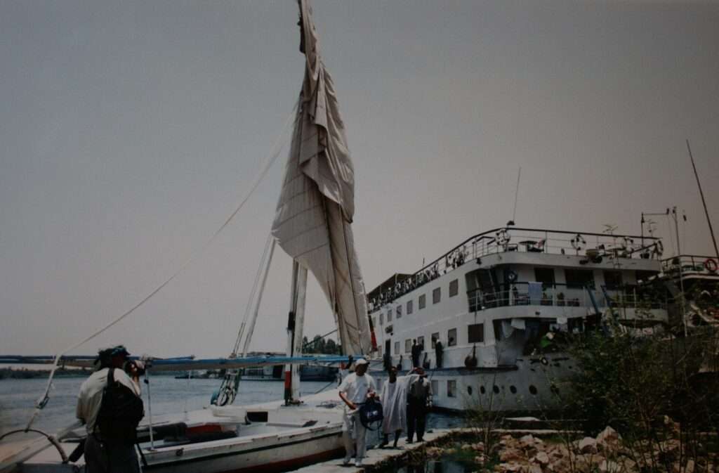 Felucca and Nile cruise boat moored at Aswan